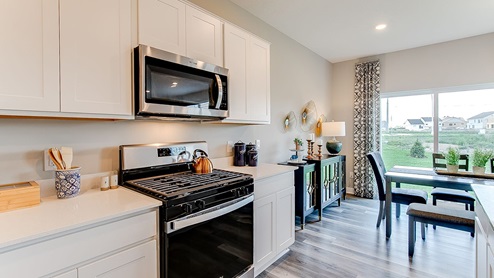 View of kitchen and dinette.