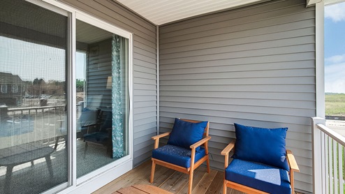 Covered deck accessible via bedroom suite.