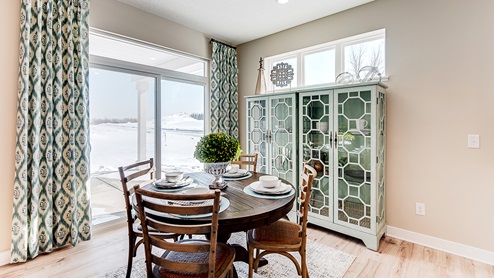 Dinette area with sliding glass doors.