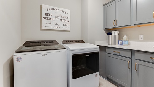 Upper level laundry room.