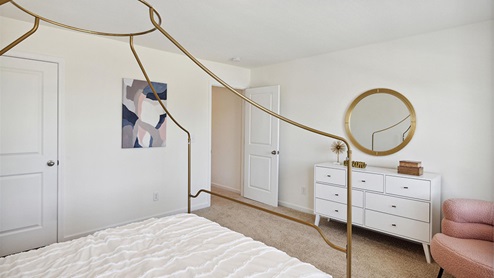 Interior bedroom with closet and natural lighting