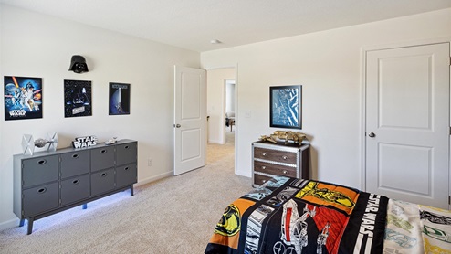 Interior bedroom with closet and natural lighting