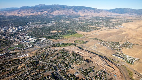 Aerial of Wolfridge community with downtown in the background