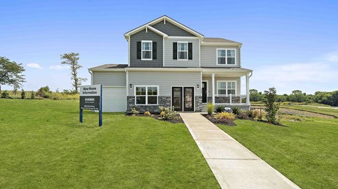 Bellamy front exterior rendering with siding, stone, and two car garage, new homes in Kansas City, MO