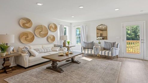 Living room with couch and chairs