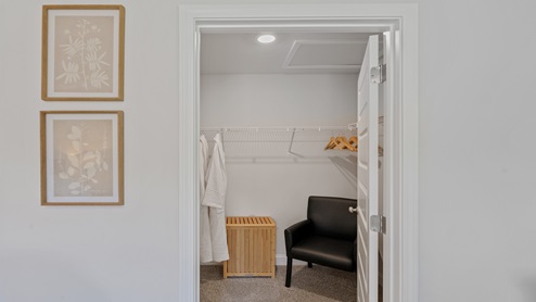 Walk in closet in primary suite