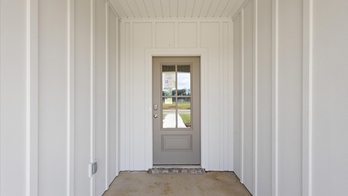 Front door leading into home