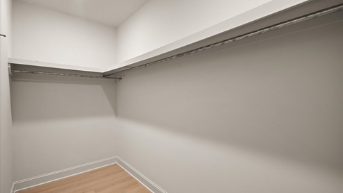 Walk in closet wooden shelving