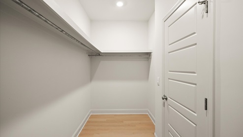 Walk in closet wooden shelving