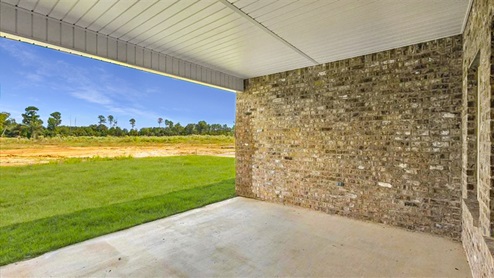 Patio opens to greenspace