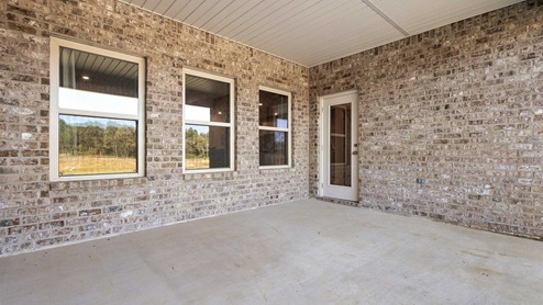 Patio opens to greenspace