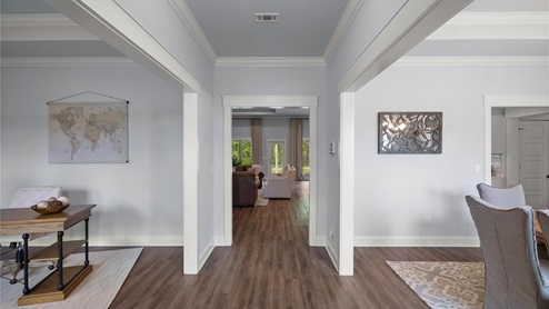 Interior hallway next to dining and living area