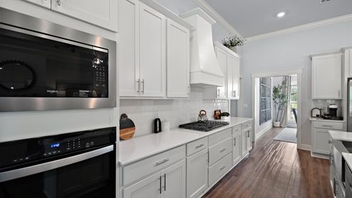 Interior kitchen with white cabinets