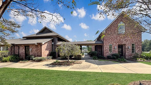 Cornerstone community clubhouse with blue sky.