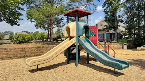 Tot lot slide and climbing area.