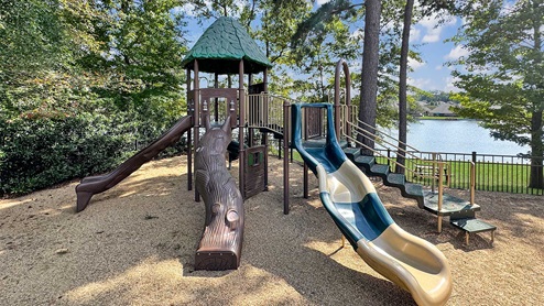 Cornerstone community playground with slide and climbing area.