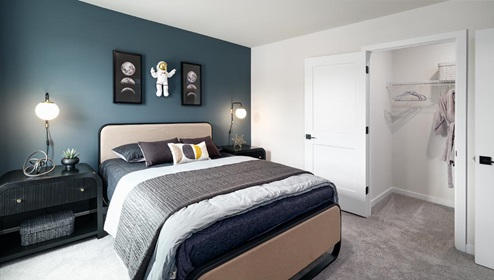 Carpeted bedroom with medium window