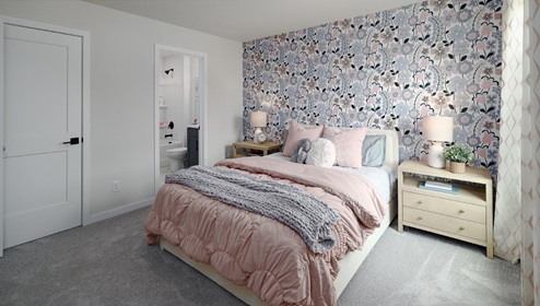 Carpeted bedroom with medium window