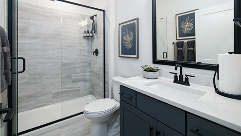 Bathroom with standing glass shower