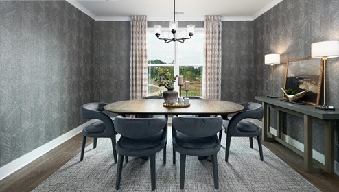Dining room with wood floors and large window