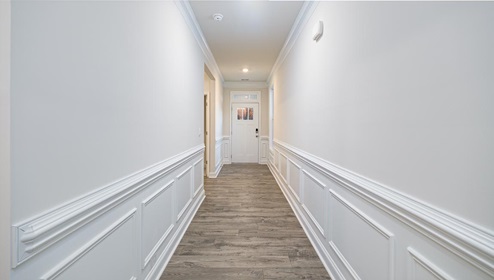 Welcoming foyer with view of front hallway.