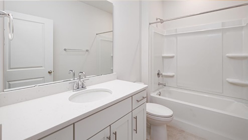 Bathroom with bathtub and shower combination