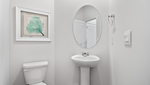 Bathroom with toilet and sink.