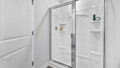 Primary bathroom with a shower.