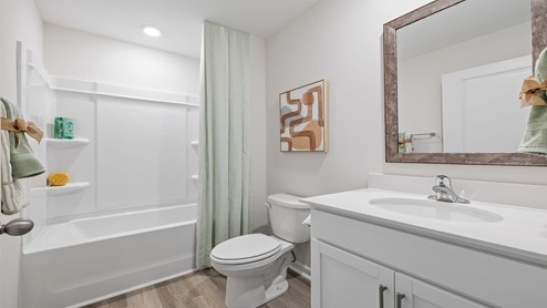 Bathroom with sink and shwoer.