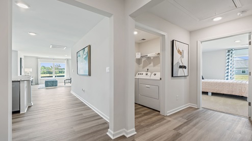 Hallway with view of rooms.