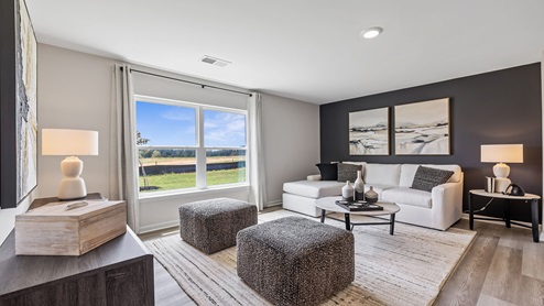 Family room with windows.