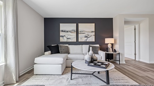 Family room with windows.
