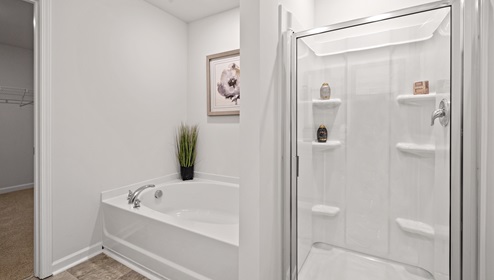 Primary bathroom with double vanity sinks.