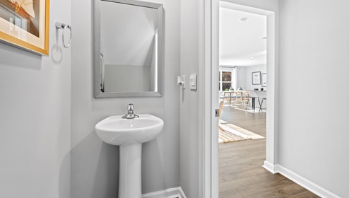 Bathroom with sink and toilet.