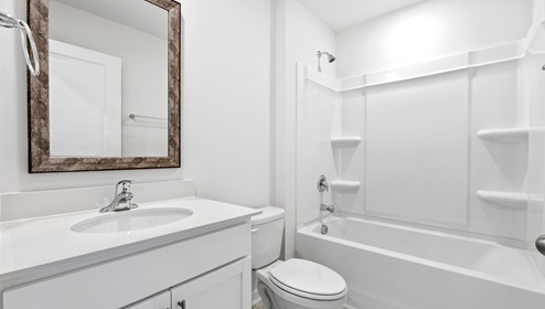 Bathroom with sink and tub.