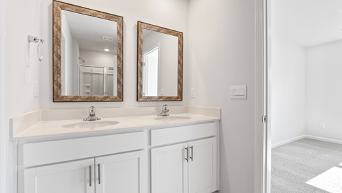 Bathroom with double vanity sink.