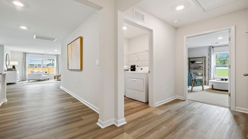Hallway with view of rooms.