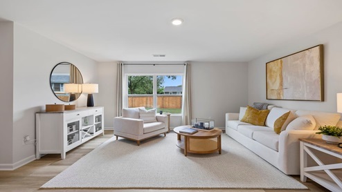 Family room with windows.