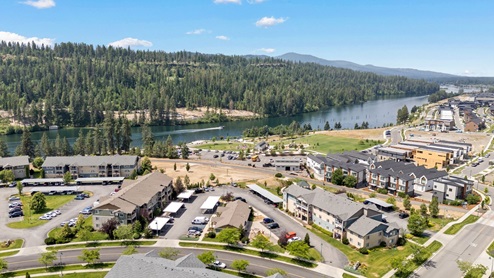 A drone shot of the Spokane River down the street from Grand Mill Townhomes