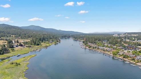 A drone shot of the Spokane River down the street from Grand Mill Townhomes