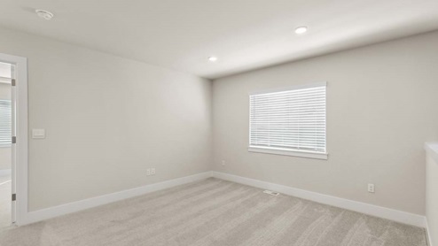 Upper floor loft space outside primary bedroom suite of Rainier floor plan