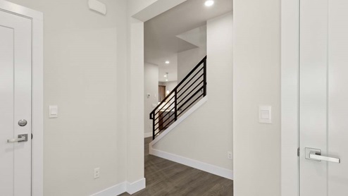 View from Rainier plan entry foyer, showing stair with modern open railing