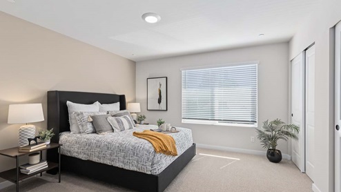 Bennett floor plan private bedroom suite which provides a large window and storage closet