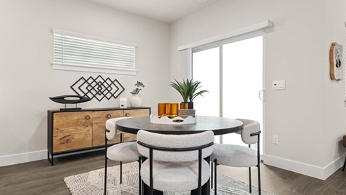 Spacious dining space with access to back yard