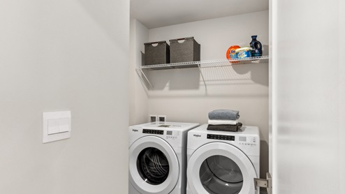 laundry room on the upper level close to bedrooms