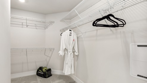 Large walk in closet in the primary bedroom suite