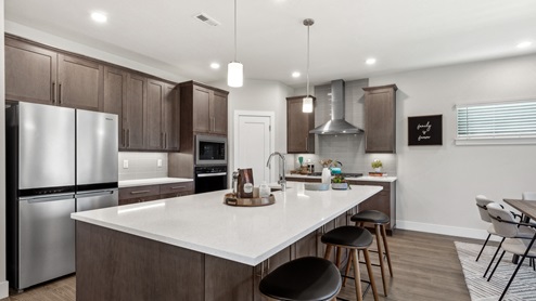 Kitchen with stainless-stell appliances