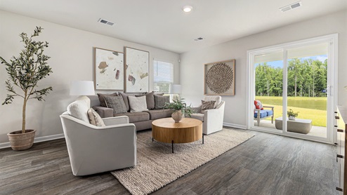 living room with ample lighting