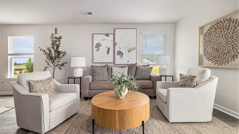 living room with ample lighting