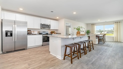 kitchen with white cabinets